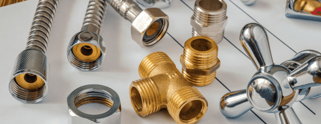 A variety of pipes, hoses, bolts, and other plumbing hardware.