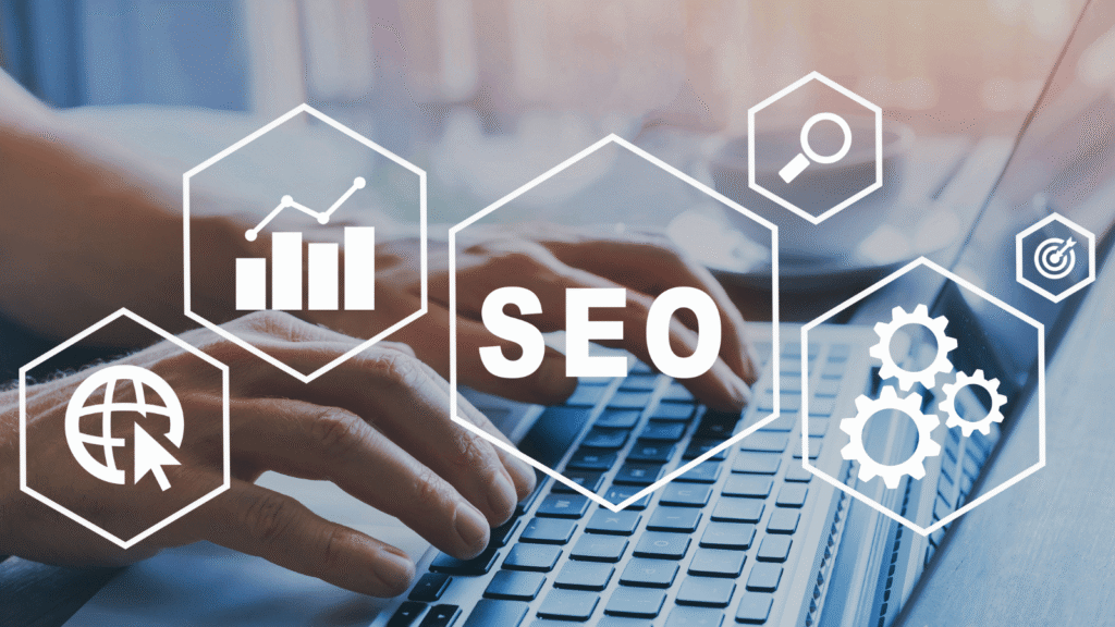 person working on laptop with graphic reading "SEO" overlayed